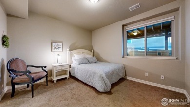 Experience the best of both worlds: watch golfers tee off across on Highland Meadows Golf Course in Colorado - for sale on GolfHomes.com, golf home, golf lot