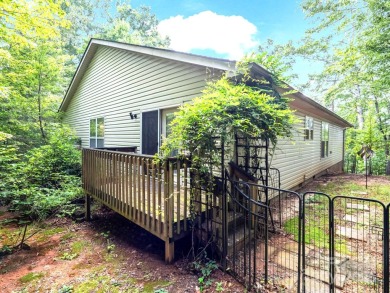 Move-in ready w/many updates, low maintenance yard & seasonal on Rumbling Bald Resort on Lake Lure in North Carolina - for sale on GolfHomes.com, golf home, golf lot