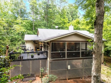 Move-in ready w/many updates, low maintenance yard & seasonal on Rumbling Bald Resort on Lake Lure in North Carolina - for sale on GolfHomes.com, golf home, golf lot