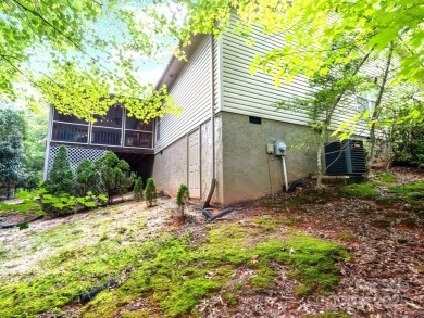 Move-in ready w/many updates, low maintenance yard & seasonal on Rumbling Bald Resort on Lake Lure in North Carolina - for sale on GolfHomes.com, golf home, golf lot