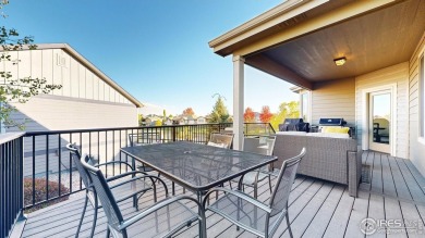 Experience the best of both worlds: watch golfers tee off across on Highland Meadows Golf Course in Colorado - for sale on GolfHomes.com, golf home, golf lot