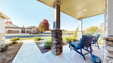 Experience the best of both worlds: watch golfers tee off across on Highland Meadows Golf Course in Colorado - for sale on GolfHomes.com, golf home, golf lot