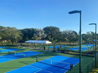 This beautifully designed single-story home is 4 BR plus office on BallenIsles Golf and Country Club in Florida - for sale on GolfHomes.com, golf home, golf lot
