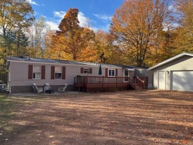 Enjoy year round living from this 2 bedroom- 2 bath well on McCauslin Brook Golf and Country Club in Wisconsin - for sale on GolfHomes.com, golf home, golf lot