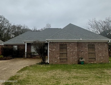 Welcome home to this perfectly located 4 bedroom 2 bath brick on Bay Pointe Golf and Resort in Mississippi - for sale on GolfHomes.com, golf home, golf lot