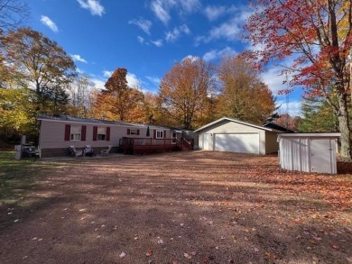 Enjoy year round living from this 2 bedroom- 2 bath well on McCauslin Brook Golf and Country Club in Wisconsin - for sale on GolfHomes.com, golf home, golf lot