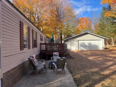 Enjoy year round living from this 2 bedroom- 2 bath well on McCauslin Brook Golf and Country Club in Wisconsin - for sale on GolfHomes.com, golf home, golf lot