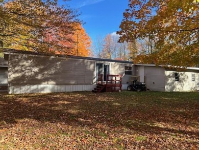 Enjoy year round living from this 2 bedroom- 2 bath well on McCauslin Brook Golf and Country Club in Wisconsin - for sale on GolfHomes.com, golf home, golf lot