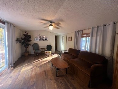 Enjoy year round living from this 2 bedroom- 2 bath well on McCauslin Brook Golf and Country Club in Wisconsin - for sale on GolfHomes.com, golf home, golf lot