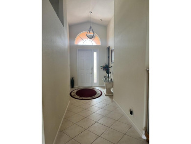This beautiful home, overlooking the lush fairway of the on St. James Golf Club in Florida - for sale on GolfHomes.com, golf home, golf lot
