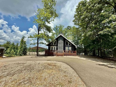 Charming cabin in the heart of Pickwick!  Minutes to golf course on Shiloh Falls Golf Club in Tennessee - for sale on GolfHomes.com, golf home, golf lot