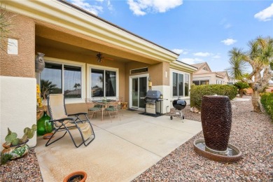 This charming 2-bedroom, 2-bathroom home in Sun City MacDonald on Desert Willow Golf Course in Nevada - for sale on GolfHomes.com, golf home, golf lot