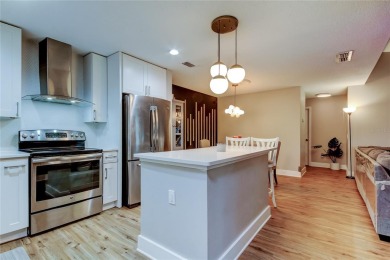 Something Special Awaits! Welcome to this fully renovated on Hunters Green Country Club in Florida - for sale on GolfHomes.com, golf home, golf lot