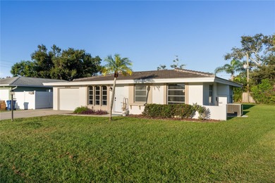 Get ready to fall in love with this absolutely charming and on Venice East Golf Club in Florida - for sale on GolfHomes.com, golf home, golf lot