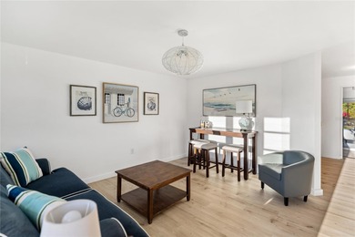 Get ready to fall in love with this absolutely charming and on Venice East Golf Club in Florida - for sale on GolfHomes.com, golf home, golf lot