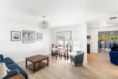 Get ready to fall in love with this absolutely charming and on Venice East Golf Club in Florida - for sale on GolfHomes.com, golf home, golf lot