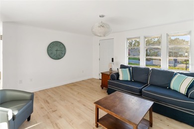 Get ready to fall in love with this absolutely charming and on Venice East Golf Club in Florida - for sale on GolfHomes.com, golf home, golf lot