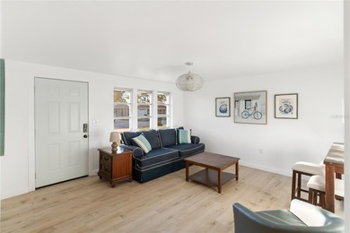 Get ready to fall in love with this absolutely charming and on Venice East Golf Club in Florida - for sale on GolfHomes.com, golf home, golf lot