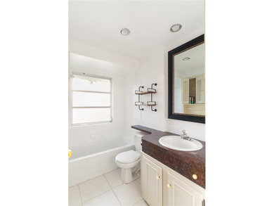 Get ready to fall in love with this absolutely charming and on Venice East Golf Club in Florida - for sale on GolfHomes.com, golf home, golf lot