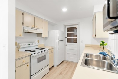 Get ready to fall in love with this absolutely charming and on Venice East Golf Club in Florida - for sale on GolfHomes.com, golf home, golf lot