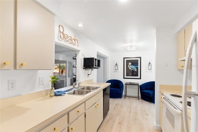 Get ready to fall in love with this absolutely charming and on Venice East Golf Club in Florida - for sale on GolfHomes.com, golf home, golf lot