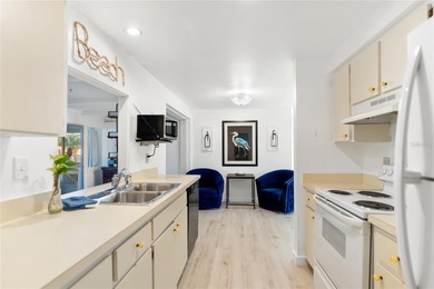 Get ready to fall in love with this absolutely charming and on Venice East Golf Club in Florida - for sale on GolfHomes.com, golf home, golf lot