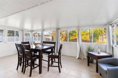 Get ready to fall in love with this absolutely charming and on Venice East Golf Club in Florida - for sale on GolfHomes.com, golf home, golf lot