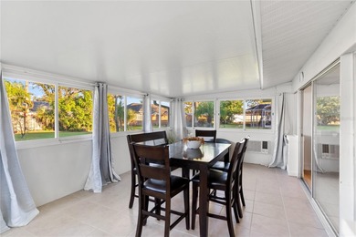 Get ready to fall in love with this absolutely charming and on Venice East Golf Club in Florida - for sale on GolfHomes.com, golf home, golf lot