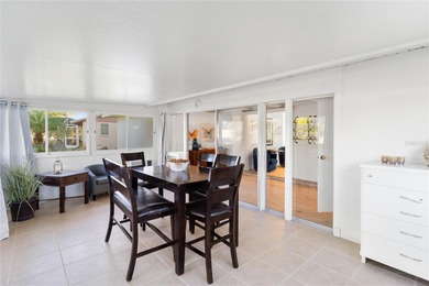 Get ready to fall in love with this absolutely charming and on Venice East Golf Club in Florida - for sale on GolfHomes.com, golf home, golf lot