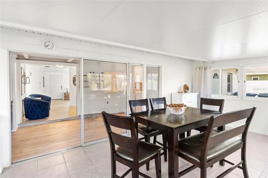 Get ready to fall in love with this absolutely charming and on Venice East Golf Club in Florida - for sale on GolfHomes.com, golf home, golf lot