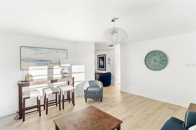 Get ready to fall in love with this absolutely charming and on Venice East Golf Club in Florida - for sale on GolfHomes.com, golf home, golf lot