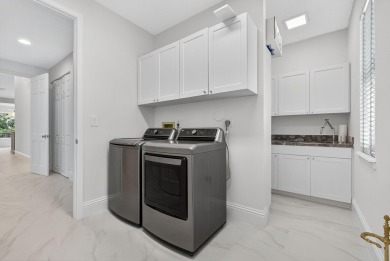 Welcome to this beautifully upgraded and impecably maintained on Greenview Cove Golf Club in Florida - for sale on GolfHomes.com, golf home, golf lot