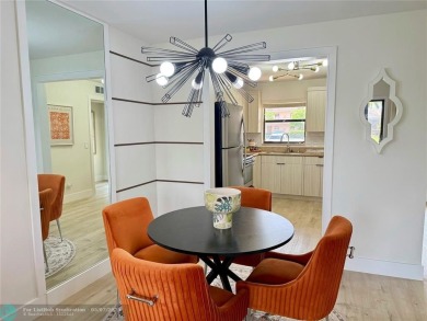 NEW BATHS, TILE  WATERPROOF FLOORING, UPDATED KITCHEN, NEW WATER on Sunrise Lakes Phase III in Florida - for sale on GolfHomes.com, golf home, golf lot