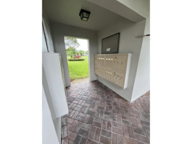 Afternoon setting sun from your huge wide enclosed patio on Kings Point Golf -Flanders Way in Florida - for sale on GolfHomes.com, golf home, golf lot