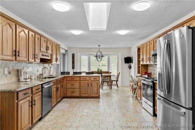Stunning 3-bedroom, 2-bathroom home perfectly perched on the on Baywood Golf Club in North Carolina - for sale on GolfHomes.com, golf home, golf lot