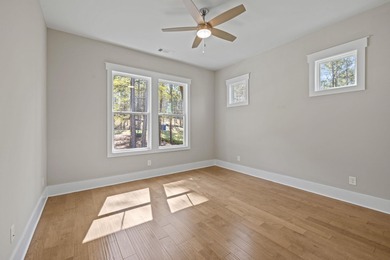 Embark on an unparalleled lifestyle in this exquisite golf-front on Harbor Club Golf and Country Club in Georgia - for sale on GolfHomes.com, golf home, golf lot