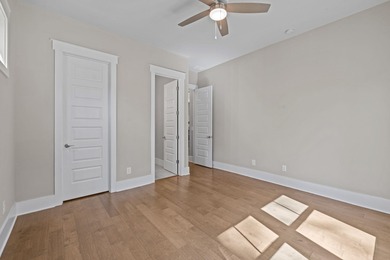 Embark on an unparalleled lifestyle in this exquisite golf-front on Harbor Club Golf and Country Club in Georgia - for sale on GolfHomes.com, golf home, golf lot