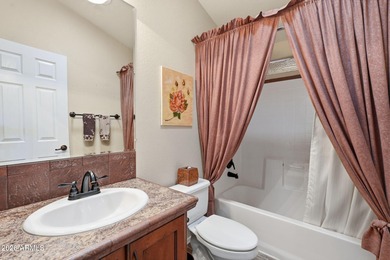 Located behind the guarded entrance of Pueblo El Mirage RV on Pueblo Golf Course in Arizona - for sale on GolfHomes.com, golf home, golf lot