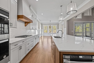 Embark on an unparalleled lifestyle in this exquisite golf-front on Harbor Club Golf and Country Club in Georgia - for sale on GolfHomes.com, golf home, golf lot