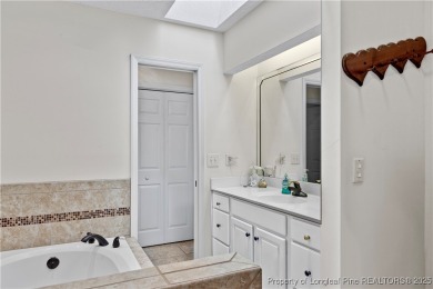 Stunning 3-bedroom, 2-bathroom home perfectly perched on the on Baywood Golf Club in North Carolina - for sale on GolfHomes.com, golf home, golf lot