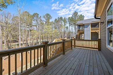 Embark on an unparalleled lifestyle in this exquisite golf-front on Harbor Club Golf and Country Club in Georgia - for sale on GolfHomes.com, golf home, golf lot