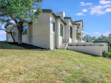 Stunning home in Summit Rock overlooking Pecan Creek and #15 on Summit Rock Golf Course in Texas - for sale on GolfHomes.com, golf home, golf lot