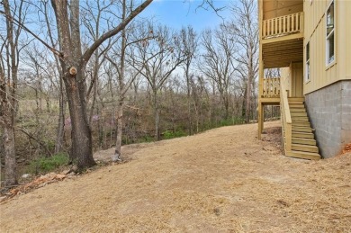 Welcome to this exquisite 3,343 sqft home, offering 5 spacious on Big Sugar Golf Club in Arkansas - for sale on GolfHomes.com, golf home, golf lot