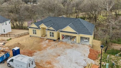 Welcome to this exquisite 3,343 sqft home, offering 5 spacious on Big Sugar Golf Club in Arkansas - for sale on GolfHomes.com, golf home, golf lot