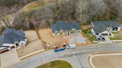 Welcome to this exquisite 3,343 sqft home, offering 5 spacious on Big Sugar Golf Club in Arkansas - for sale on GolfHomes.com, golf home, golf lot