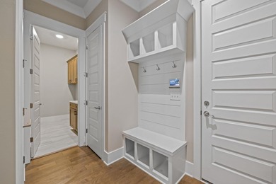 Embark on an unparalleled lifestyle in this exquisite golf-front on Harbor Club Golf and Country Club in Georgia - for sale on GolfHomes.com, golf home, golf lot