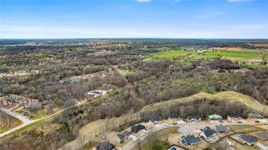 Welcome to this exquisite 3,343 sqft home, offering 5 spacious on Big Sugar Golf Club in Arkansas - for sale on GolfHomes.com, golf home, golf lot