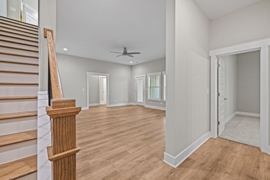 Embark on an unparalleled lifestyle in this exquisite golf-front on Harbor Club Golf and Country Club in Georgia - for sale on GolfHomes.com, golf home, golf lot