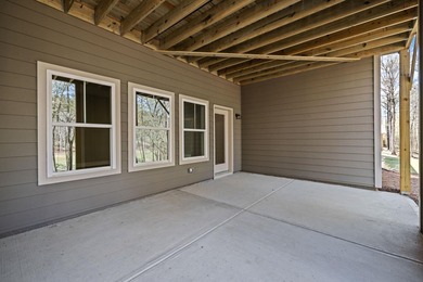 Embark on an unparalleled lifestyle in this exquisite golf-front on Harbor Club Golf and Country Club in Georgia - for sale on GolfHomes.com, golf home, golf lot