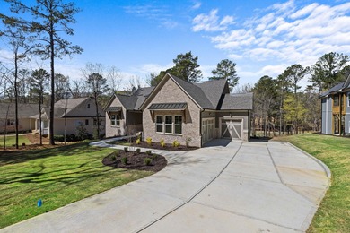 Embark on an unparalleled lifestyle in this exquisite golf-front on Harbor Club Golf and Country Club in Georgia - for sale on GolfHomes.com, golf home, golf lot